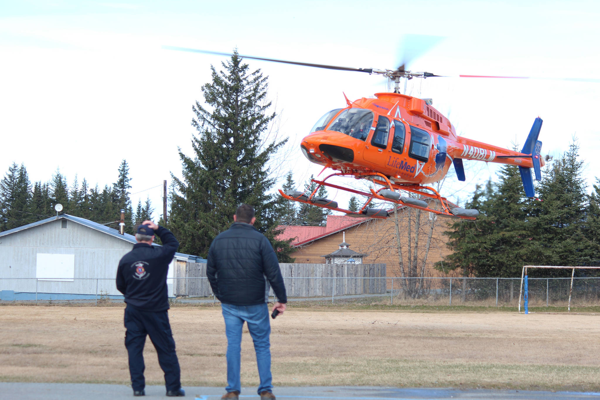 &lt;span class="neFMT neFMT_PhotoCredit"&gt;Photo by Megan Pacer/Homer News&lt;/span&gt;                                A LifeMed helicopter based out of Soldotna lands in front of Anchor Point Emergency Services Chief Al Terry (left) and Chapman School Principal Conrad Woodhead (right) on Friday, May 11 behind the school in Anchor Point. Woodhead and Terry contacted LifeMed to organize a demonstration for students.