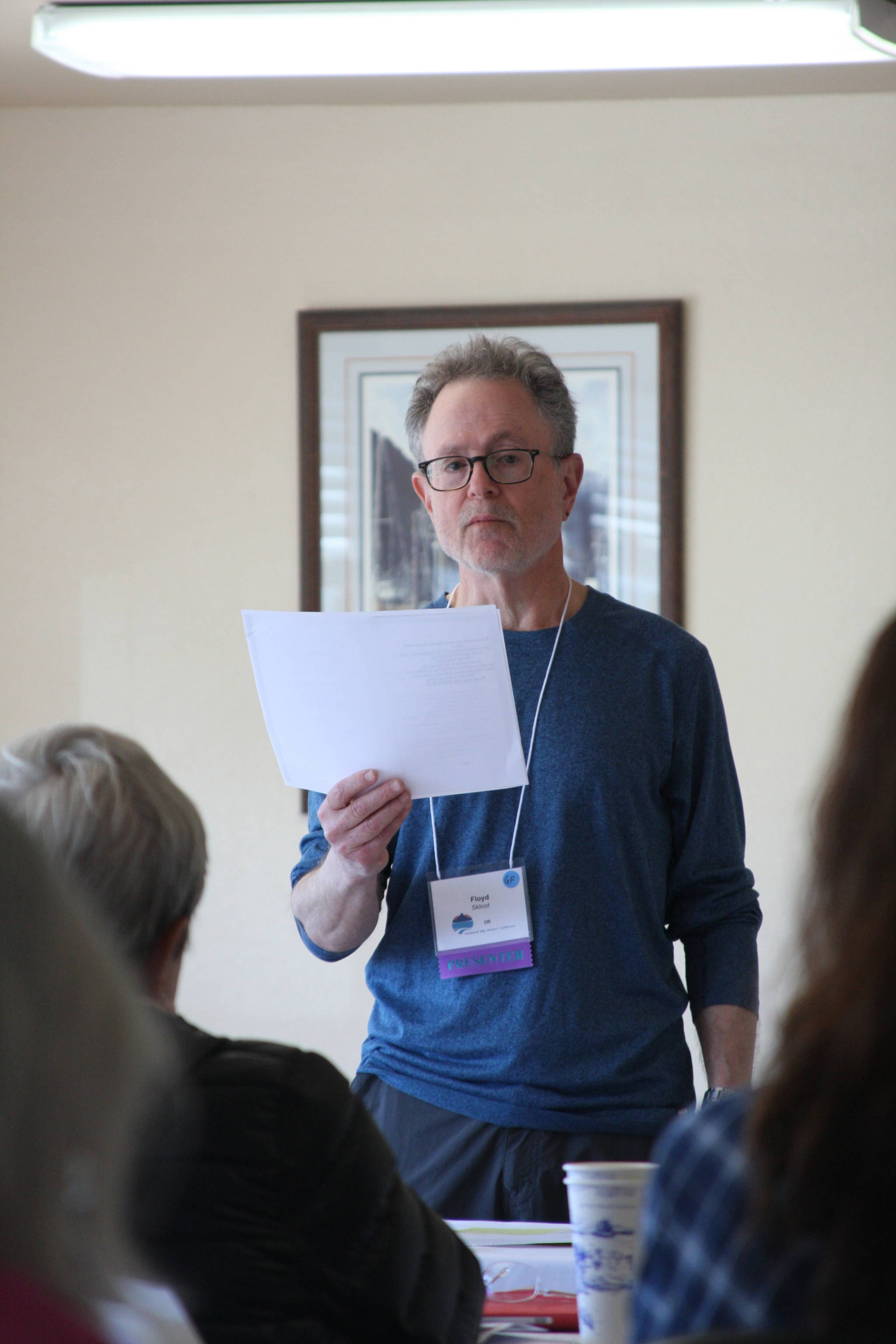 Brooklyn-native poet and novelist Floyd Skloot teaches attending writers to find the hidden music within poetry during his workshop, “The Territory of Hidden Music”, at the Kachemak Bay Writers’ Conference on Saturday, June 9, 2018 at Land’s End Resort in Homer, Alaska. (Photo by Delcenia Cosman)