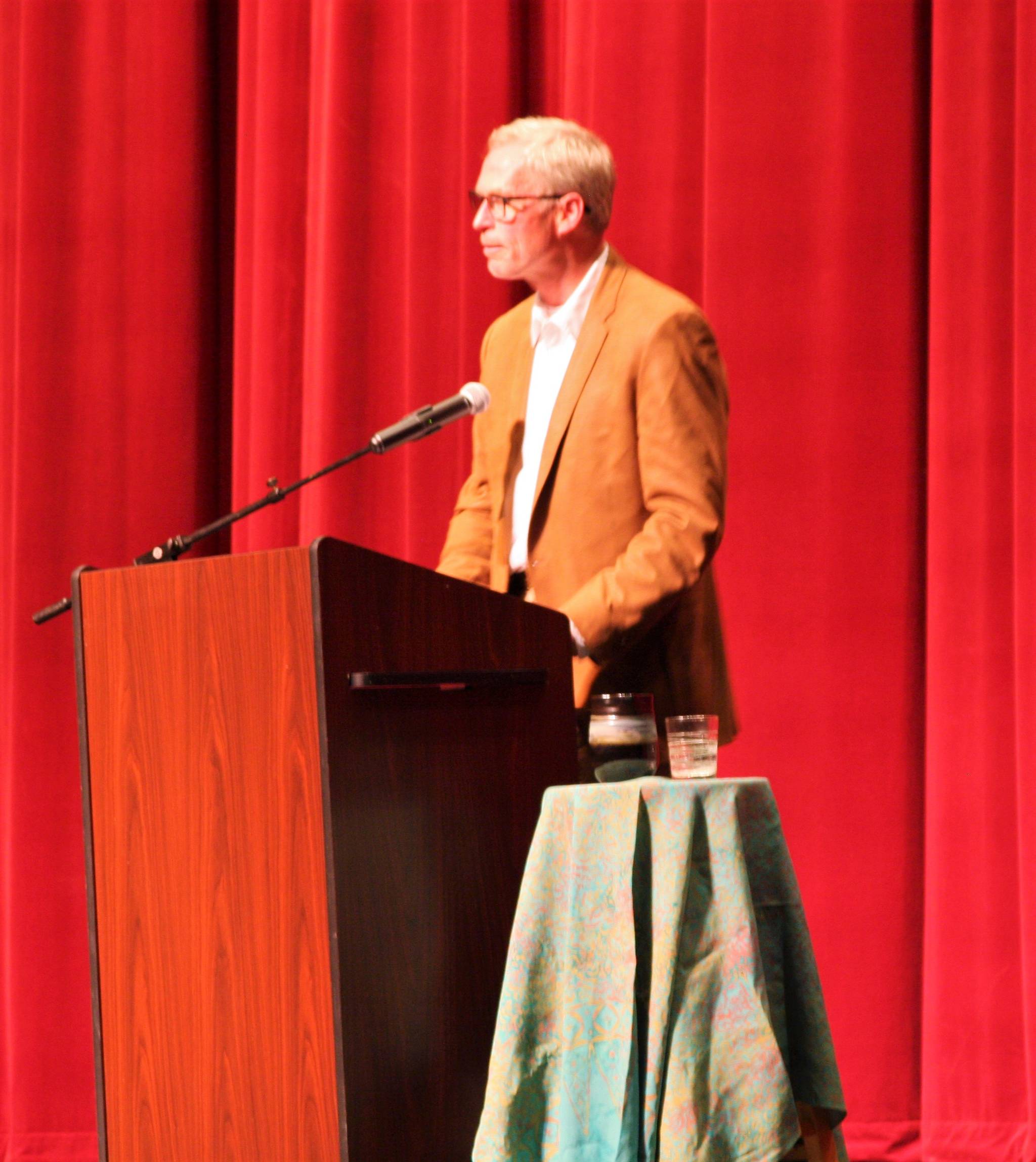 University of Alaska President Jim Johnsen introduces the 2018 Kachemak Bay Writers’ Conference keynote speaker Anthony Doerr before his public reading on Saturday, June 9, 2018 at the Homer High School Mariner Theatre in Homer, Alaska. (Photo by Delcenia Cosman)