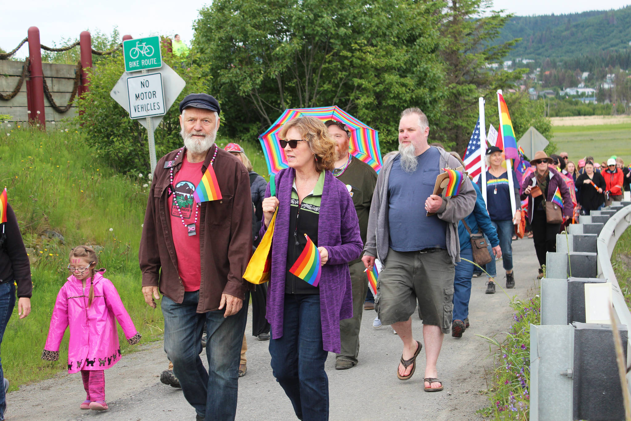 Rep. Paul Seaton (R-Homer) walks with his wife, Tina, along Ocean Drive during Homer’s first Pride March on Saturday, June 23, 2018 in Homer, Alaska. Several representatives of local government and the clergy participated in the march. (Photo by Megan Pacer/Homer News)