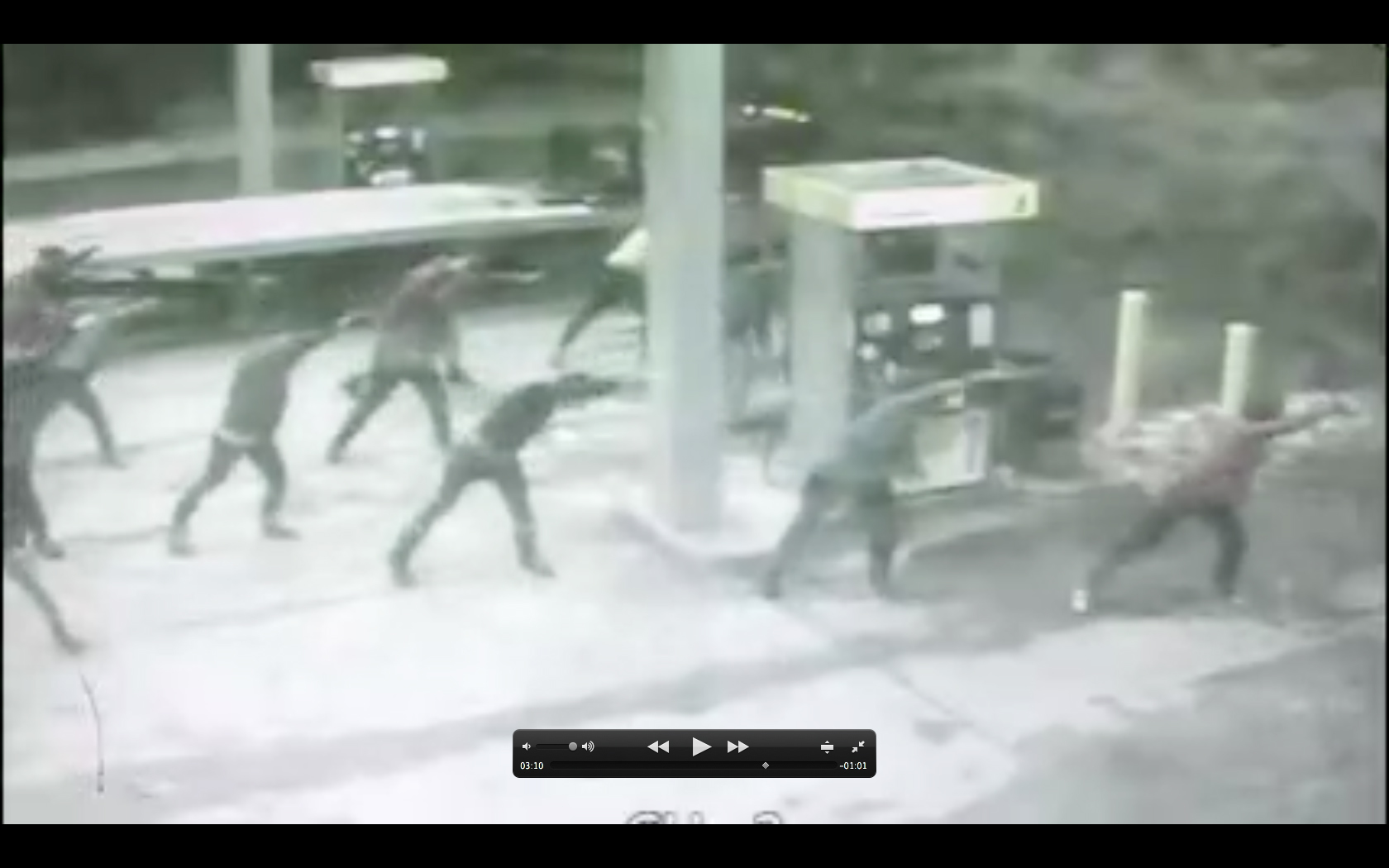 Dancers do a flash mob dance recorded by surveillance cameras at Petro Express.