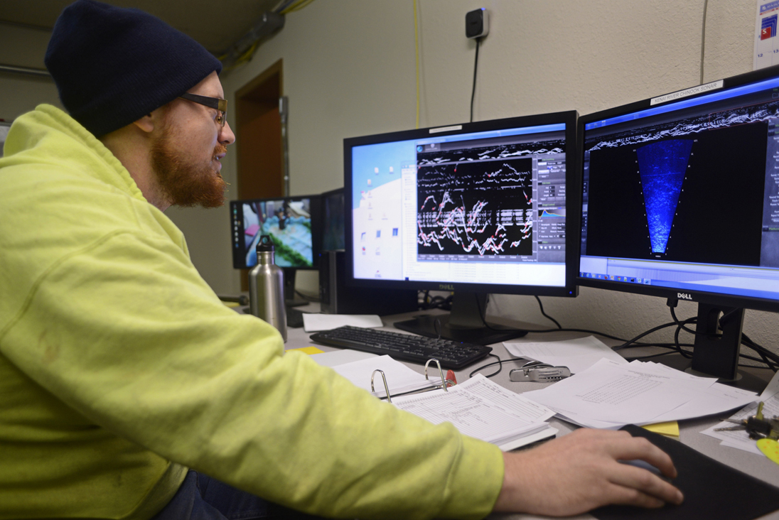 Alaska Department of Fish and Game sonar technician Brandon Key shows off the latest iteration of software and hardware that runs the sonar program on the Kenai River Nov. 1 in Soldotna. Currently there are two sonar sites on the river counting king salmon, one that is used for management and the other a research site which could eventually become the primary sonar on the river. In the weeks since the late run of Kenai River king salmon ended, Key has spent his time analyzing footage from the site that researchers did not have time to watch during the fishing season.