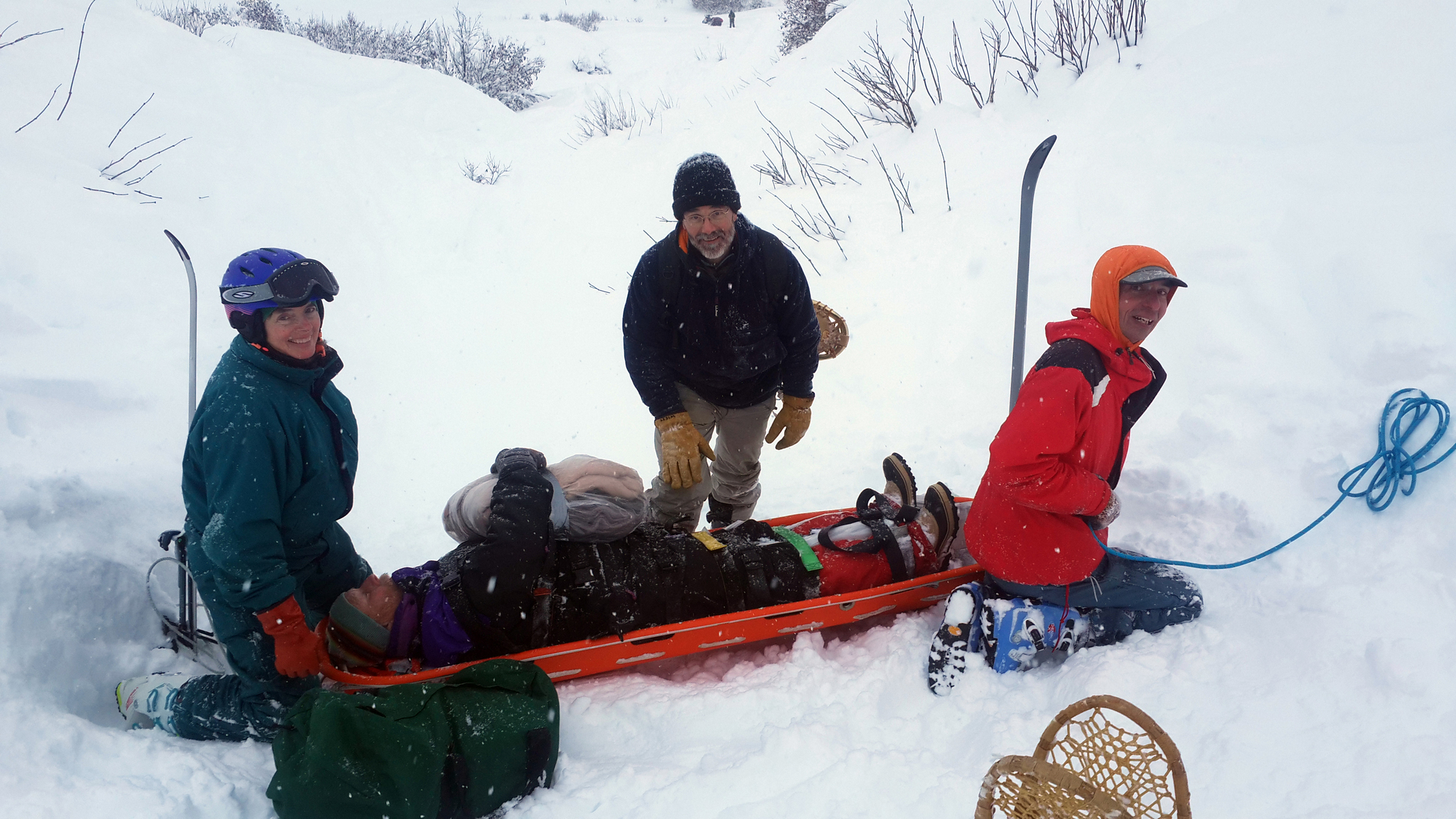 Kachemak Ski Club members do rescue training on Sunday at the Homer Rope Tow. Participating were, from left to right, Karen Northrup, Bill Morse (in sled), KSC president Dr. Randy Wiest, and Doug Reid.