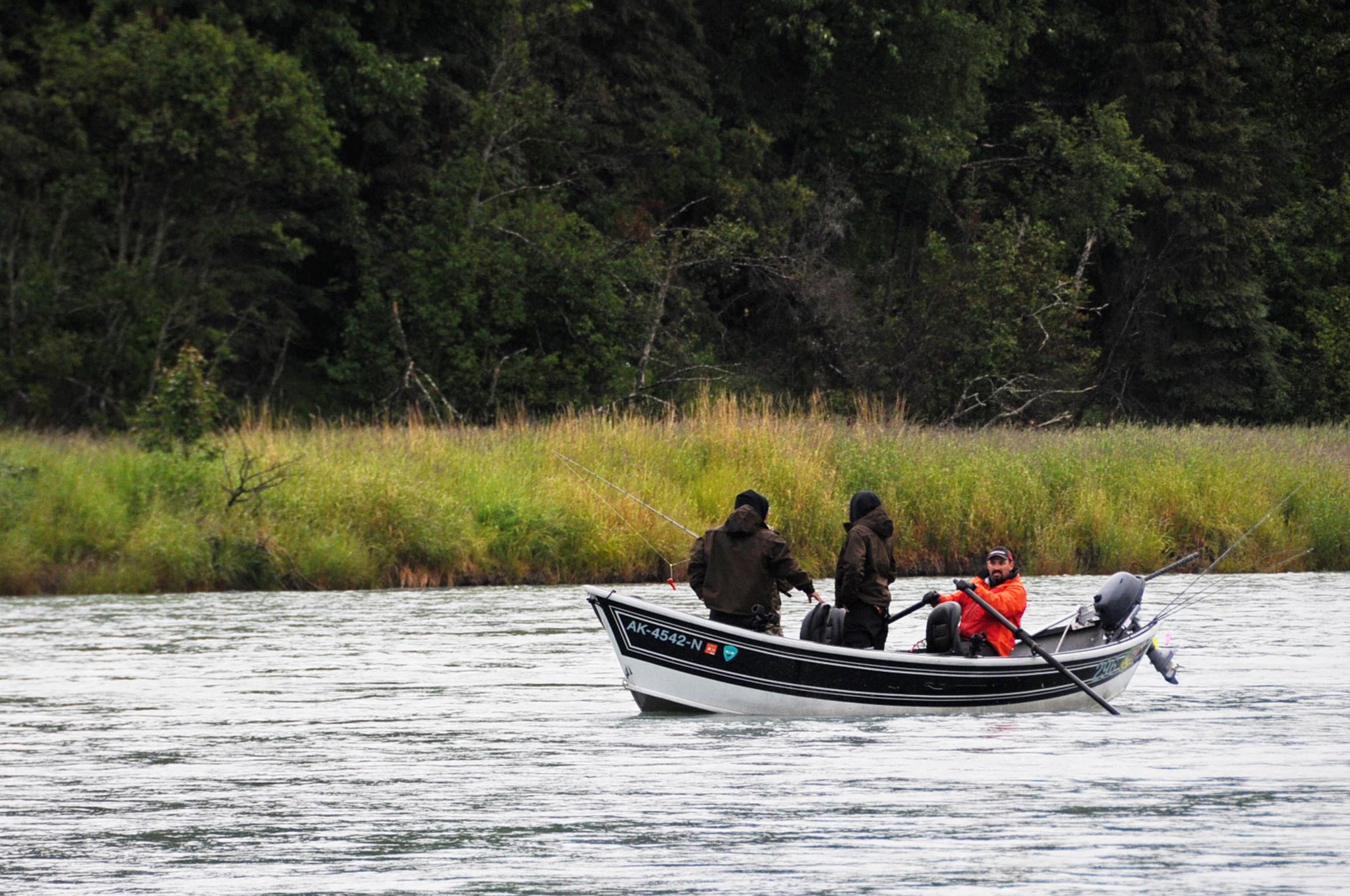 In this June 2016 photo, a guide rows clients on the Kasilof River near the confluence with Crooked Creek in Kasilof, Alaska. (Elizabeth Earl/Peninsula Clarion, file)