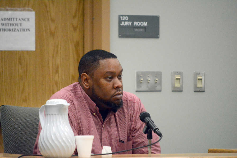Guy Johnson testifies during the trial of Demarqus Green on Friday. Green is charged with the murder of Demian Sagerser. Johnson is a friend of Green and was testifying about some of the events during the day on July 7, 2012, when Sagerser was killed.