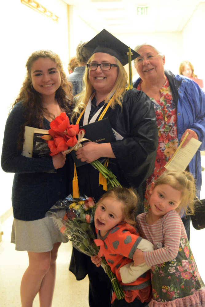 Nina Ellen Gunnell poses for a photo after graduating with an associate of applied science degree in radiologic technology after Kachemak Bay Campus commencement last Wednesday. With her are her daughter, Halen Hernandez, left, daughter, Valkyrie Gunnell, second from left, and friend, Luka Sanders, third from left, and mother, Nina Wolfe, right.