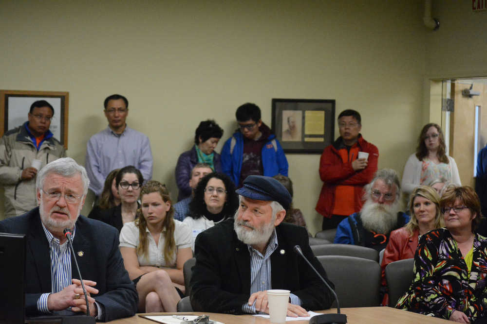 Sen. Gary Stevens, R-Kodiak, and Rep. Paul Seaton, R-Homer, speak at the Homer City Council meeting on Monday night.