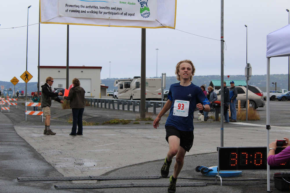Jacob Davis, 16, finishes the Spit Run in second place on Saturday, June 25.