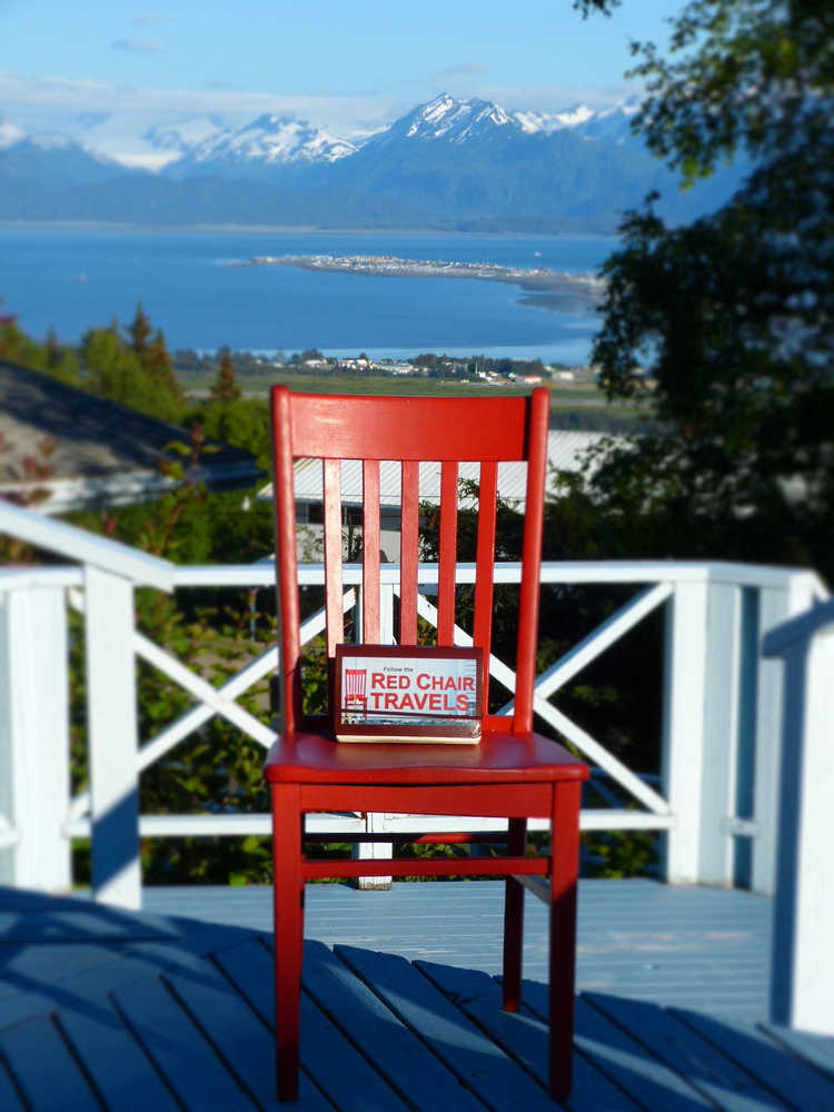 The Red Chair sits on the deck at Halcyon Heights Bed and Breakfast.