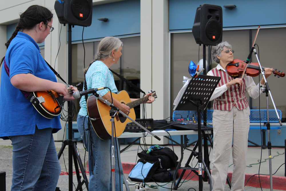 Cathy Stingley and Friends play lively music during South Peninsula Hospital's 60th Anniversary Party on Saturday, July 9.