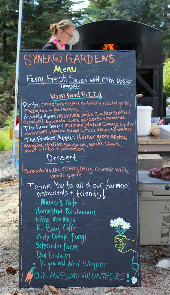 The menu for the farm-to-table dinner at the First Annual Great Garlic Scape Festival featured wood-fired pizzas topped with local produce, a farm fresh salad, and a rhubarb crumble.