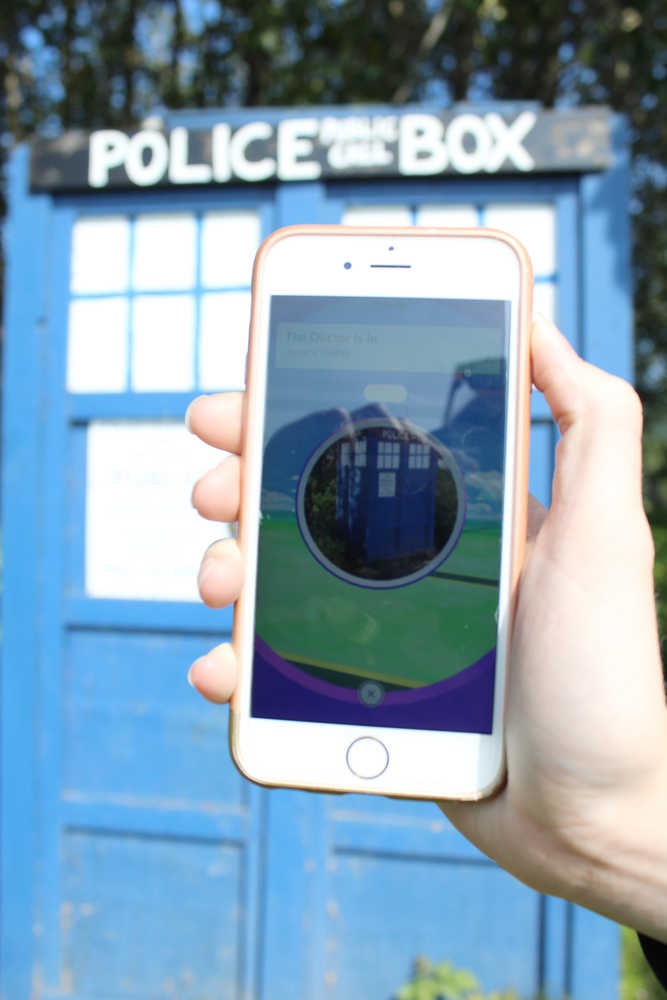 The British-style police box, known as a TARDIS to fans of science-fiction show Doctor Who, located next to HomeRun Oil is a Pokestop labeled as "The Doctor is In."