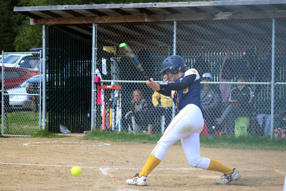 McKi Needham hits a grounder in the Mariner's last home game against South Anchorage on Saturday, May 21. Needham signed with McCook College in McCook, Nebraska, to play softball in the fall.