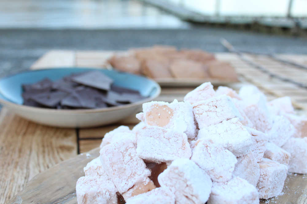 House-made salmonberry marshmallows accompany dark chocolate and house-made graham crackers to make s'mores for a bonfire on the beach at Tutka Bay Lodge.-Photo by Anna Frost, Homer News