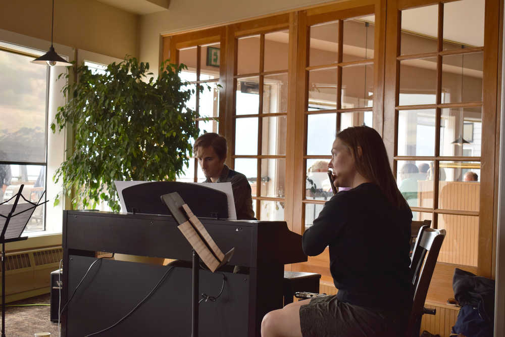 Conrad Winslow (piano) and Katie Cox (flute) perform "Sweetest Little Song," which includes many interesting alternative playing methods and also features violin.