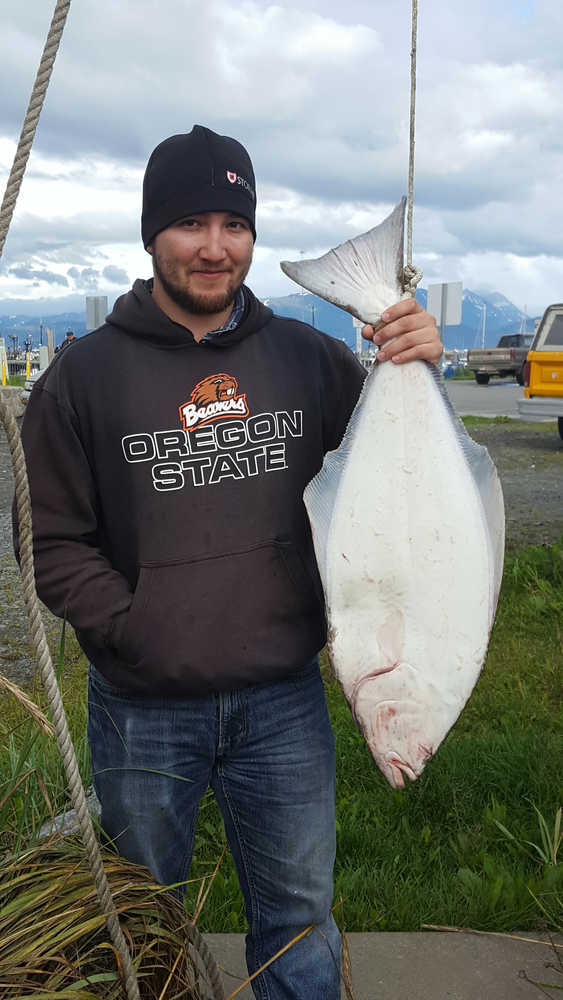 Tyler Dullum of Reno, Nevada caught a left-handed, or "lefty," halibut while fishing with Captain B's Alaskan C's Adventures on Aug. 23.