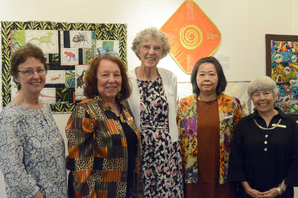 The artists in "Inspired by Books" pose at the opening last Friday at the Homer Counci on the Arts. From left to right are Connie Tarbox, Karen Fogarty, Jane Marshall, Lily Huebsch and Marilyn Kay Johnson.