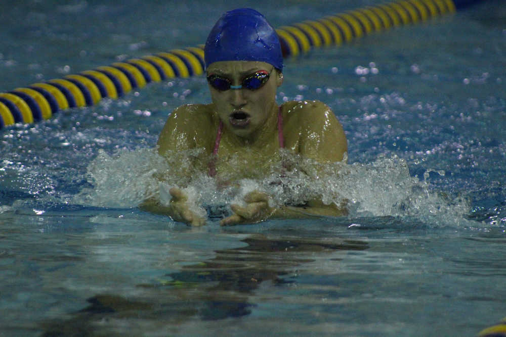 Homer Mariner Lauren Kuhns swims the breaststroke in the first heat of the girls 200-yard IM at the Homer Invite on Saturday, Sept. 10.