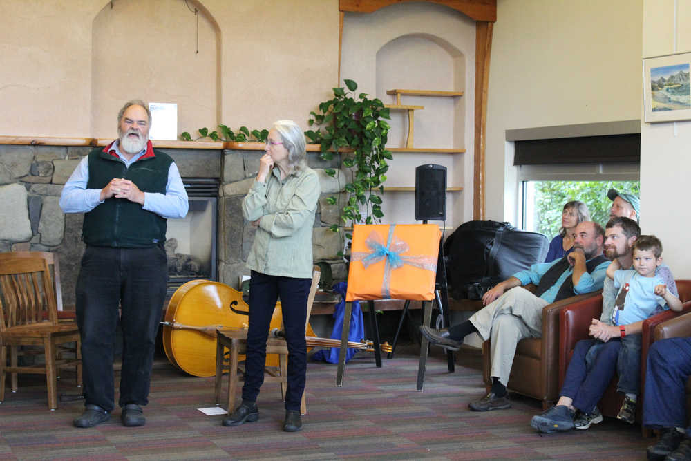 Ken Castner and Nancy Lord speak to guests at the Homer Public Library 10th Birthday celebration on Saturday, Sept. 17. Lord, who was on the library advisory board for 10 years and chaired the captial campaign that raised funds for the current building, touched on the importance of the library in the Homer community and encouraged guests to remind the city of the many services the library provides. "We have to keep convincing those who hold the purse strings that the library is a community priority and essential part of our community that needs continued funding," Lord said. "We encourage you to be good citizens as well as library users."
