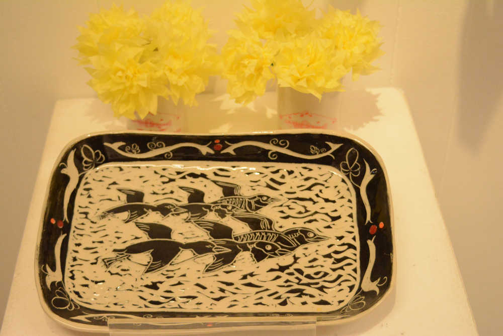 Jeff Szarzi's platter of murres was inspired by the die-off earlier this year of thousands of murres in Alaska.