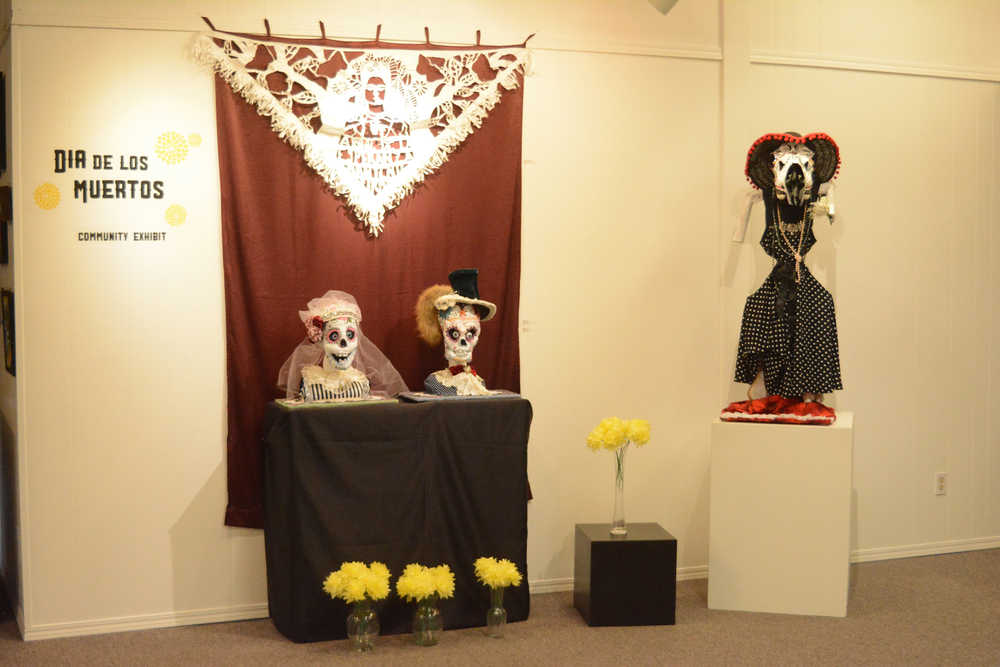 Several of the pieces in the Dia de Los Muertos exhibit at the Homer Council on the Arts.