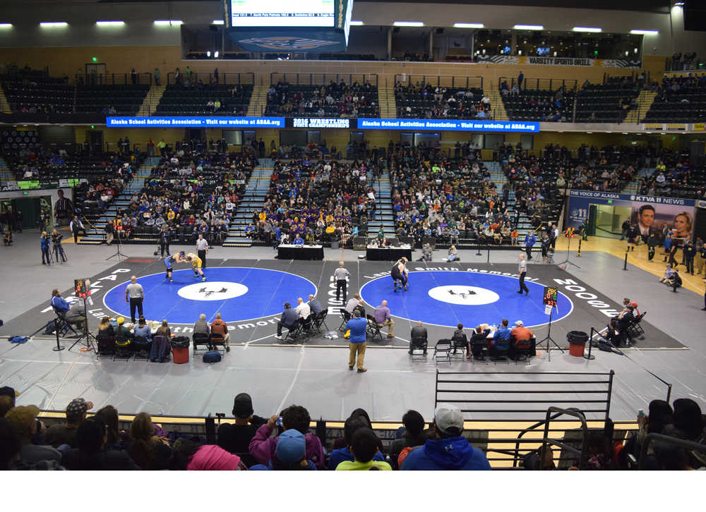 Photo by Joey Klecka/Peninsula Clarion The Class 1-2-3A and 4A state wrestling championships coincide with each other Saturday at the Alaska Airlines Center in Anchorage.