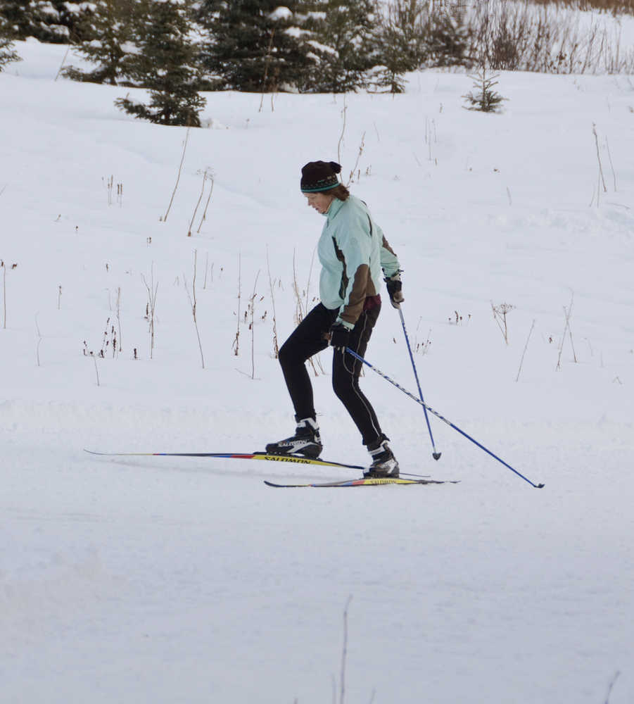 Tara Schmidt skis at the Ski Your Age event on Monday, Dec. 26, making her way across a trail at Lookout Mountain.