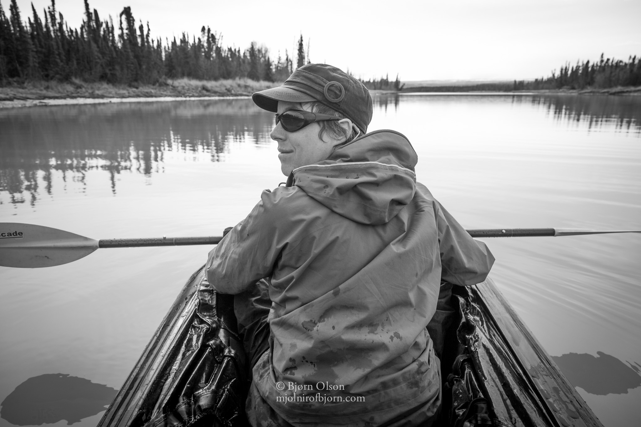 Kim McNett, the featured artist for this year’s Kachemak Bay Shorebird Festival, canoes an Alaska lake.-Photo by Bjorn Olson