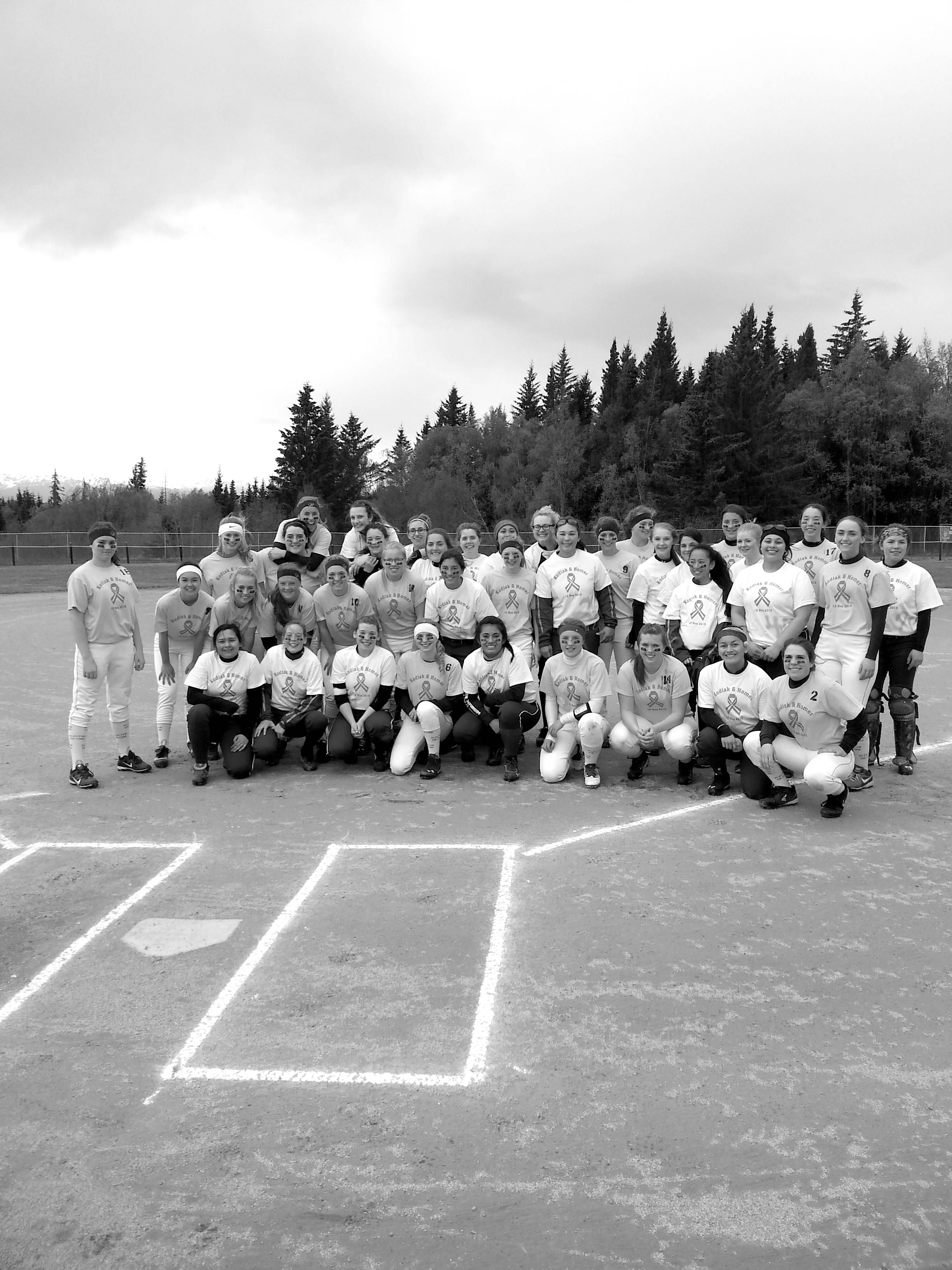 The Homer and Kodiak softball squads pose for a photo in last week’s StrikeOut Cancer Games.-Photo provided