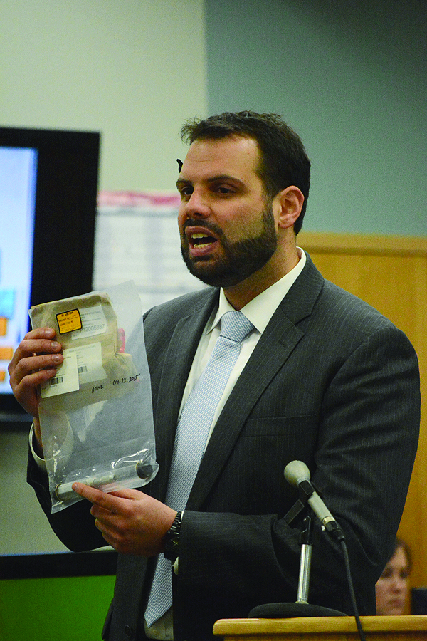 Defense attorney Adam Franklin holds the utility knife found next to Demian Sagerser after he was shot by Demarqus Green. In closing arguments, Franklin claimed Sagerser attacked Green with the knife and Green shot him in self defense.-Photo by Michael Armstrong, Homer News