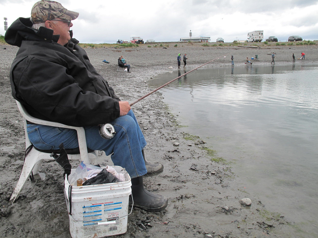 Tom Schroeder, veteran and protector of the Nick Dudiak Fishing Lagoon, says it takes an average of 10-15 hours of fishing to catch a king at the Fishing Hole. -Photo by Miranda Weiss