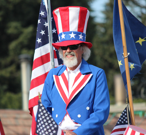 Kenai Peninsula Borough Assembly member Mako Haggerty poses as Uncle Sam in last year’s Fourth of July parade.