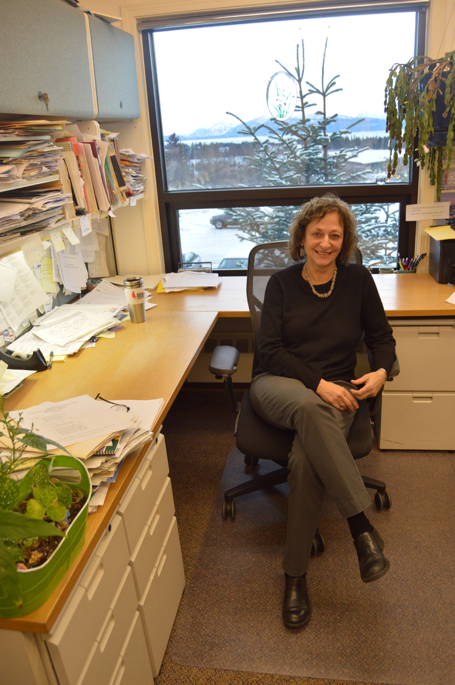 Kachemak Bay Campus Director Carol Swartz takes a break in a busy day to talk about her work. Swartz recently was honored by the Alaska Adult Education Association for her outstanding long-term contribution to lifelong learning.-Photo by Annie Rosenthal, Homer News