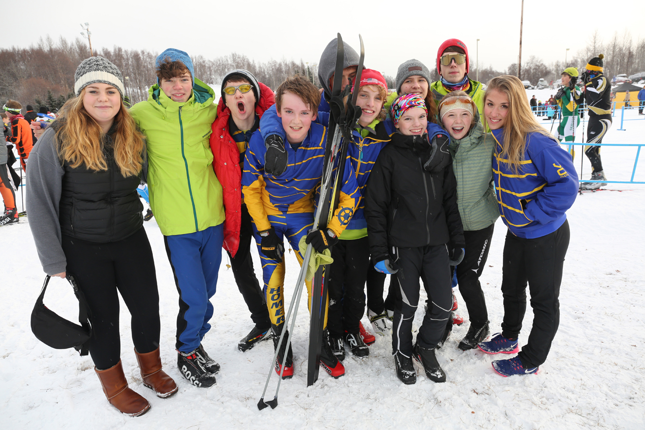 Homer High School Nordic ski team members gather together at the finish line at a recent meet. Kenai Peninsula schools compete in the Homer Invitational Ski Meet starting at 10 a.m. Saturday at the Ohlson Mountain Lookout Ski Trails. Recent rainy weather didn’t ruin the trails in the Homer hills.-photo by Alan Parks