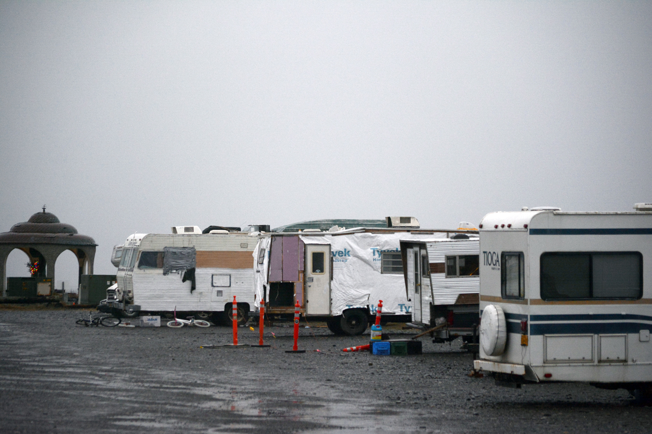 About 10 campers, cars, trucks, trailers and motorhomes were still parked by the Seafarers Memorial on Monday, Jan. 4, after a city deadline ordering campers to move.-photo by Michael Armstrong, Homer News