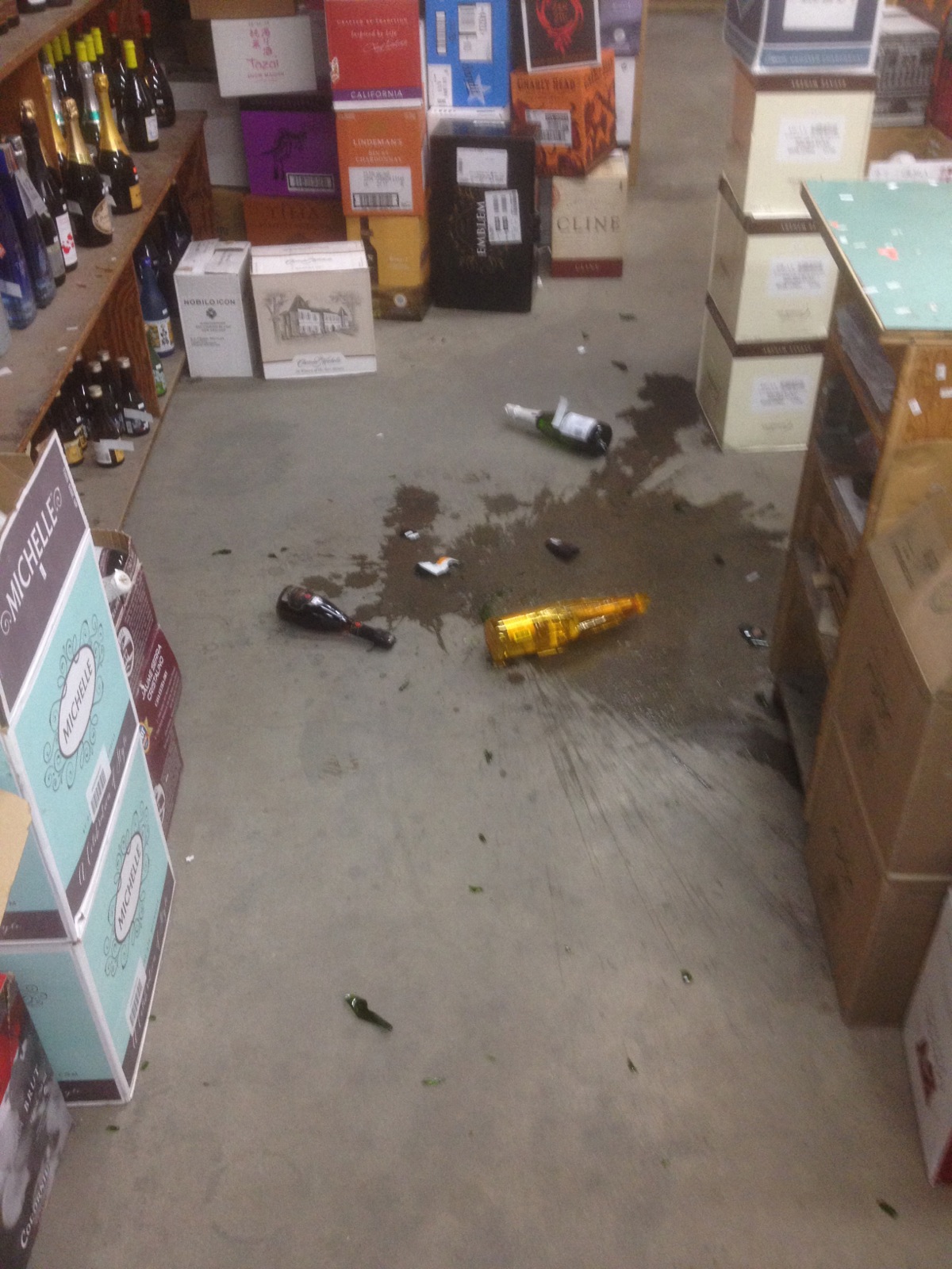 A $300 bottle of Cristal champagne fell off a shelf at the Grog Shop, but miraculously was unbroken.-Photo by Mel Strydom, Grog Shop