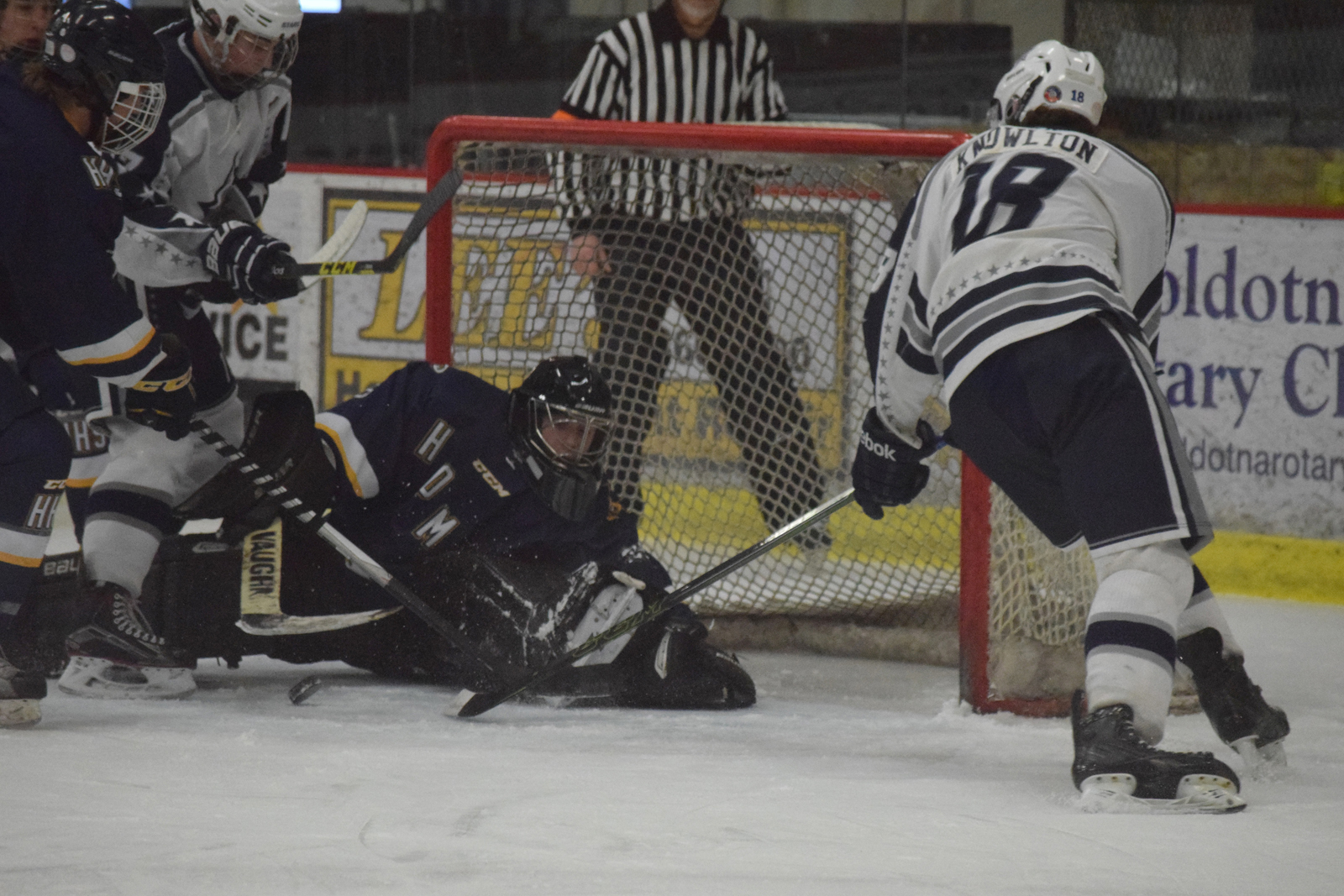 Junior Homer goaltender Riley Swanson blocks the puck from going into the Mariners’ goal Feb. 4 at the North Star Conference tournament at the Soldotna Regional Sports Complex.-Photo by Joey Klecka, Morris News Service - Alaska