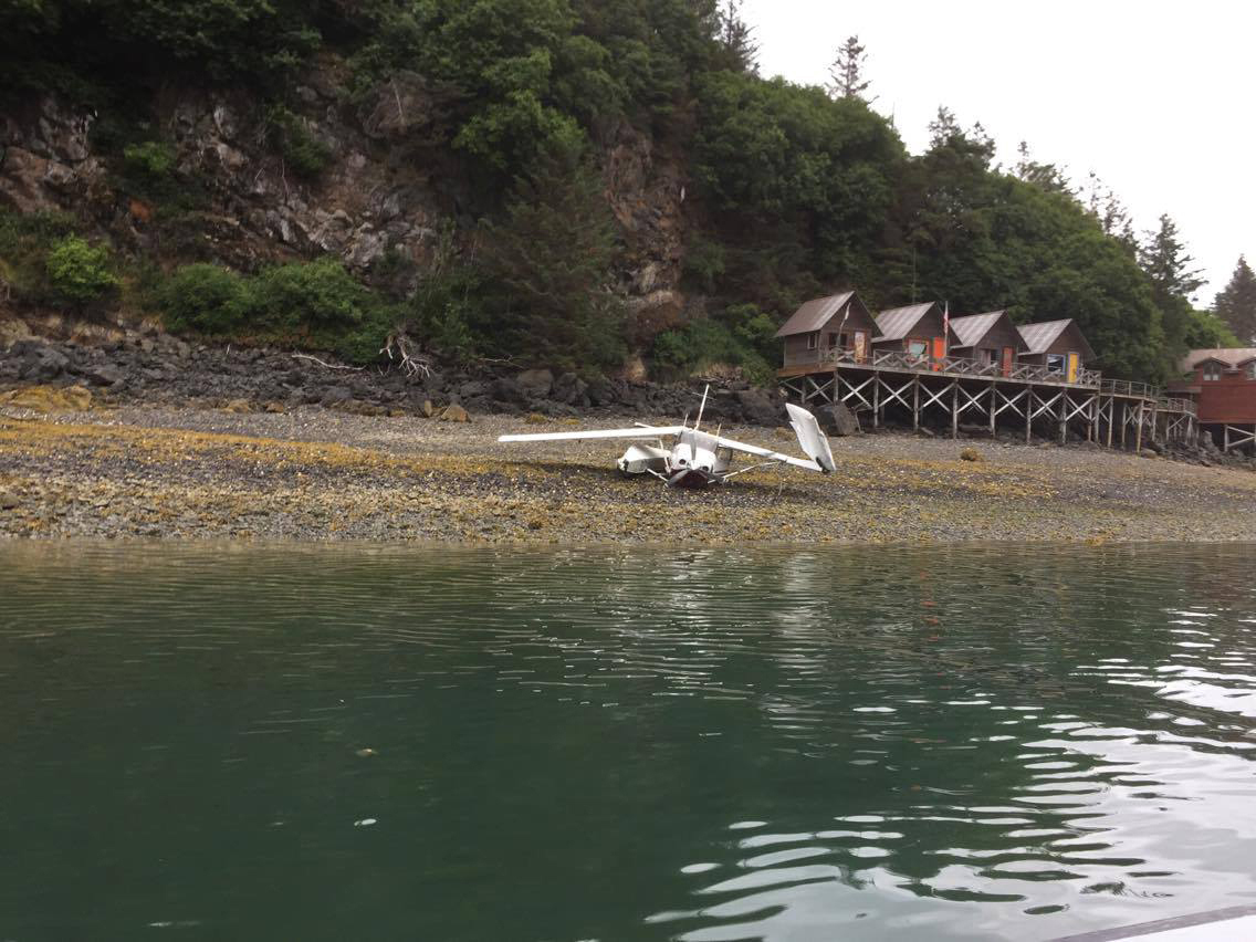 A Cessna 206 floatplane piloted by Alaska Dispatch News owner Alice Rogoff lies on the beach off Ismailof Island in Halibut