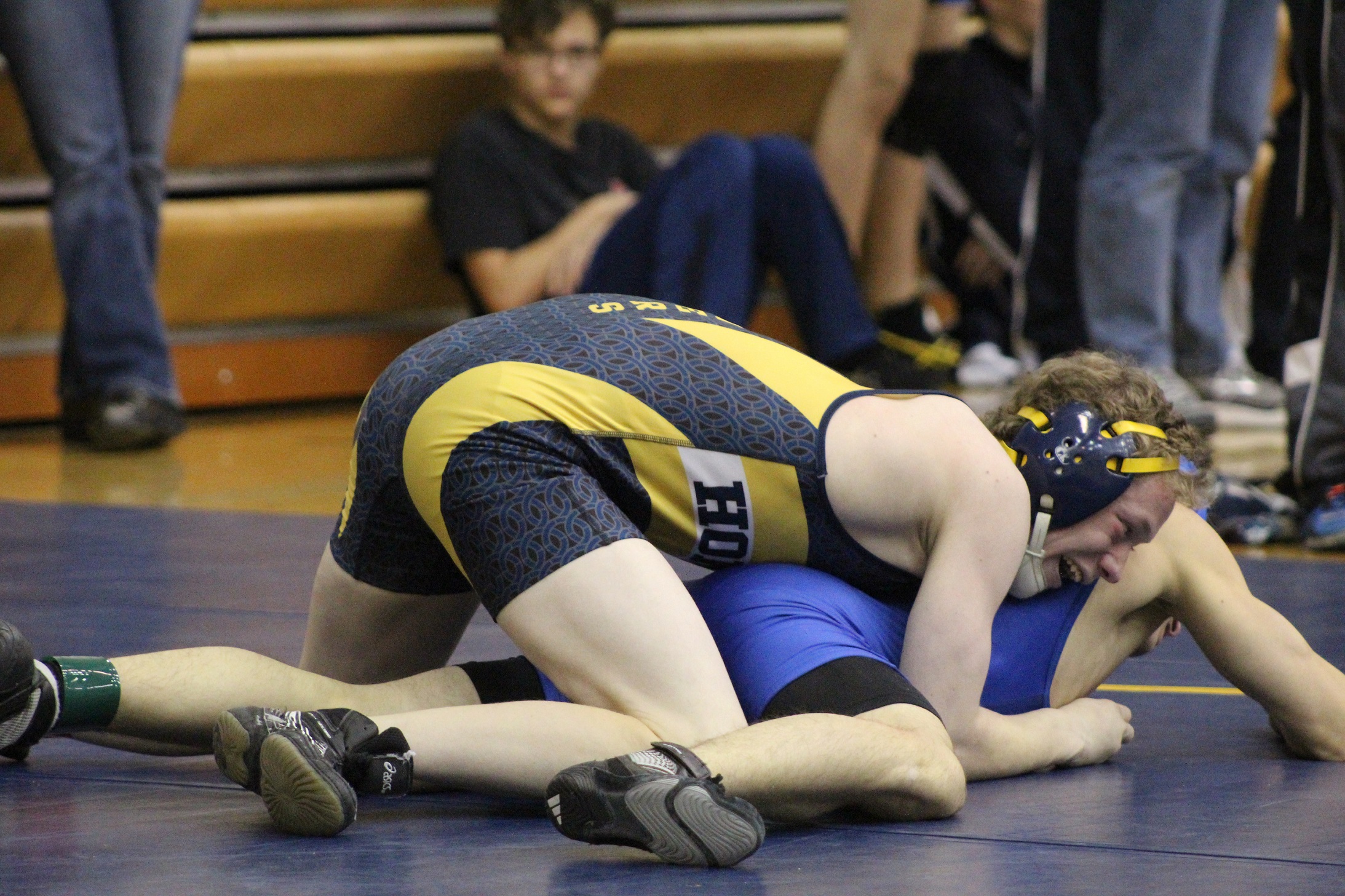 Moses Hayes works to pin down his opponent in a match at Homer High School on Saturday, Oct. 22.-Photo by Anna Frost, Homer News