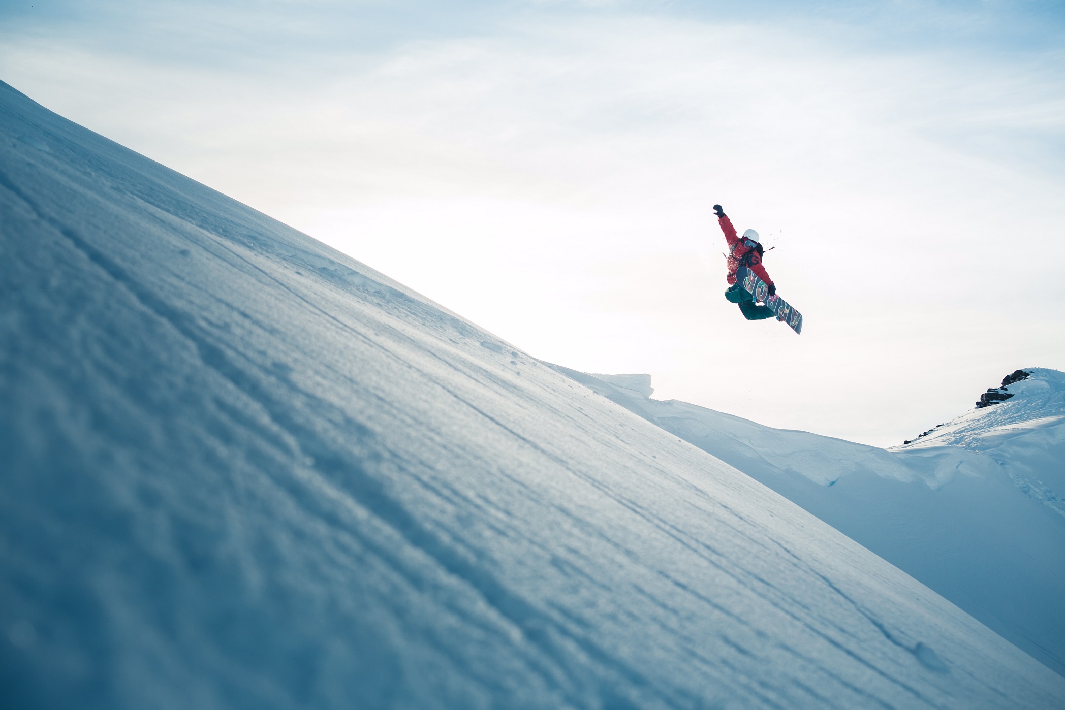 Homer-native Davey Baird flies through the air on his snowboard.-Photo provided