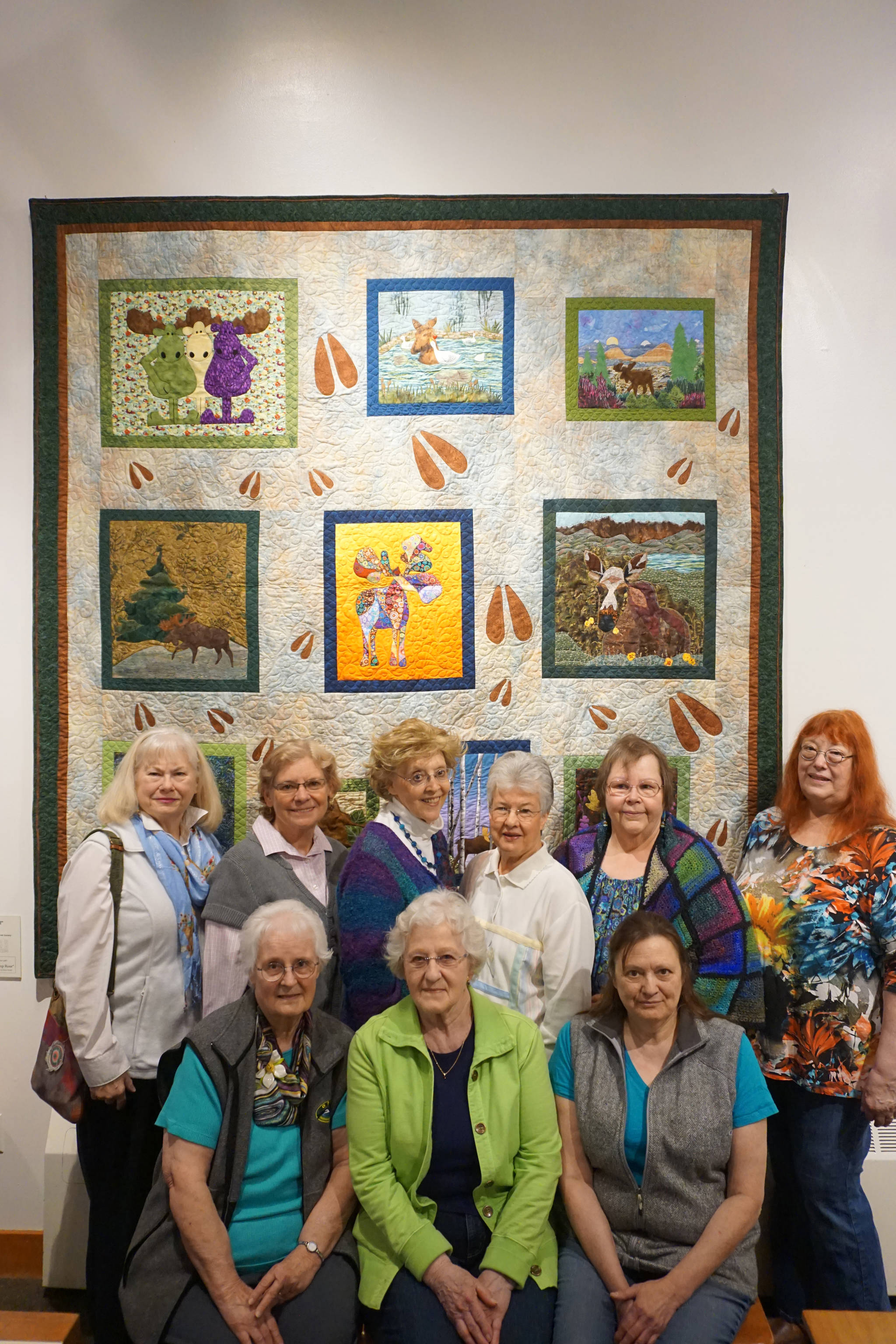 POPS, the Patrons of the Pratt, unveiled its 2017 fundraiser quilt, “Moosin’ Around,” at a luncheon on Monday. Posing with the quilt they helped make are, from left to right, top, Sherry Broome, Janet Bacher, Ruby Nofziger, Kathy Pankratz, Linda Wagner and Shirley Svoboda; from left to right, front, Eileen Wythe, Glenda Rosenbalm and Karrie Youngblood. Wythe also did this year’s bonus quilt, “Swamp Rose.”
