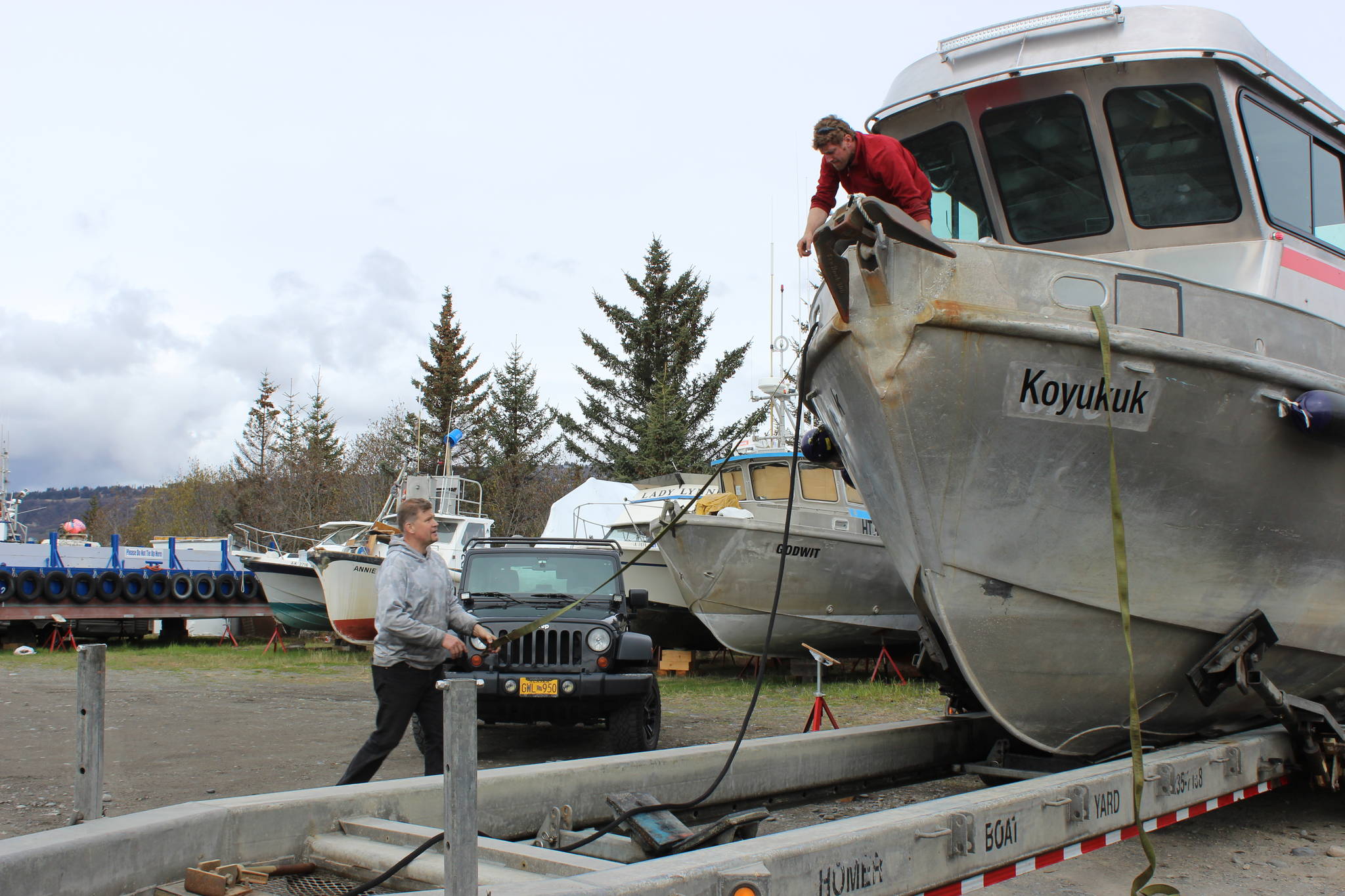 Homer’s marine trades give burned boat new life
