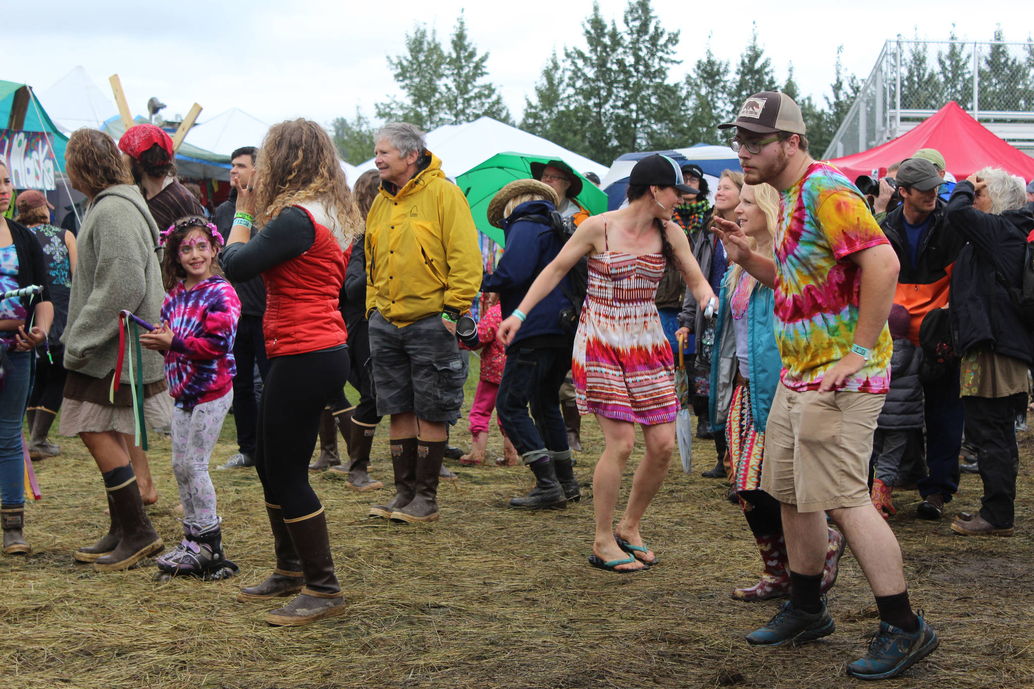 Festival-goers dance to The Inlaws and the Outlaws performance at Salmonfest’s River Stage on Aug. 6, 2016 in Ninilchi, Alaska. (File photo by Anna Frost/Homer News)