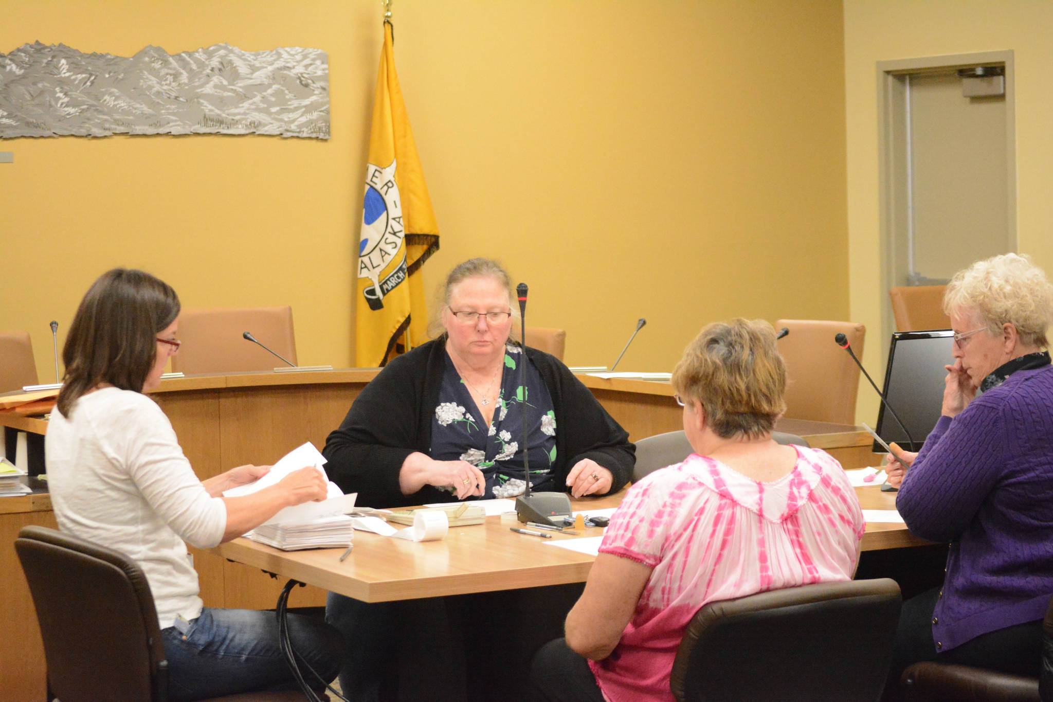 Members of the Homer Special Election Canvass Board to a hand count of the last batch of ballots on June 16, 2017, afternoon in the Cowles Council Chambers, Homer City Hall. From left to right are City Clerk Melissa Jacobsen, Deputy City Clerk Renee Krause, board member Terry Meyer and board member Maryann Lyda. The election to recall Homer City Council members Donna Aderhold, David Lewis and Catriona Reynolds failed, with the “no” votes winning by 57 percent for Aderhold and Lewis and 56 percent for Reynolds.