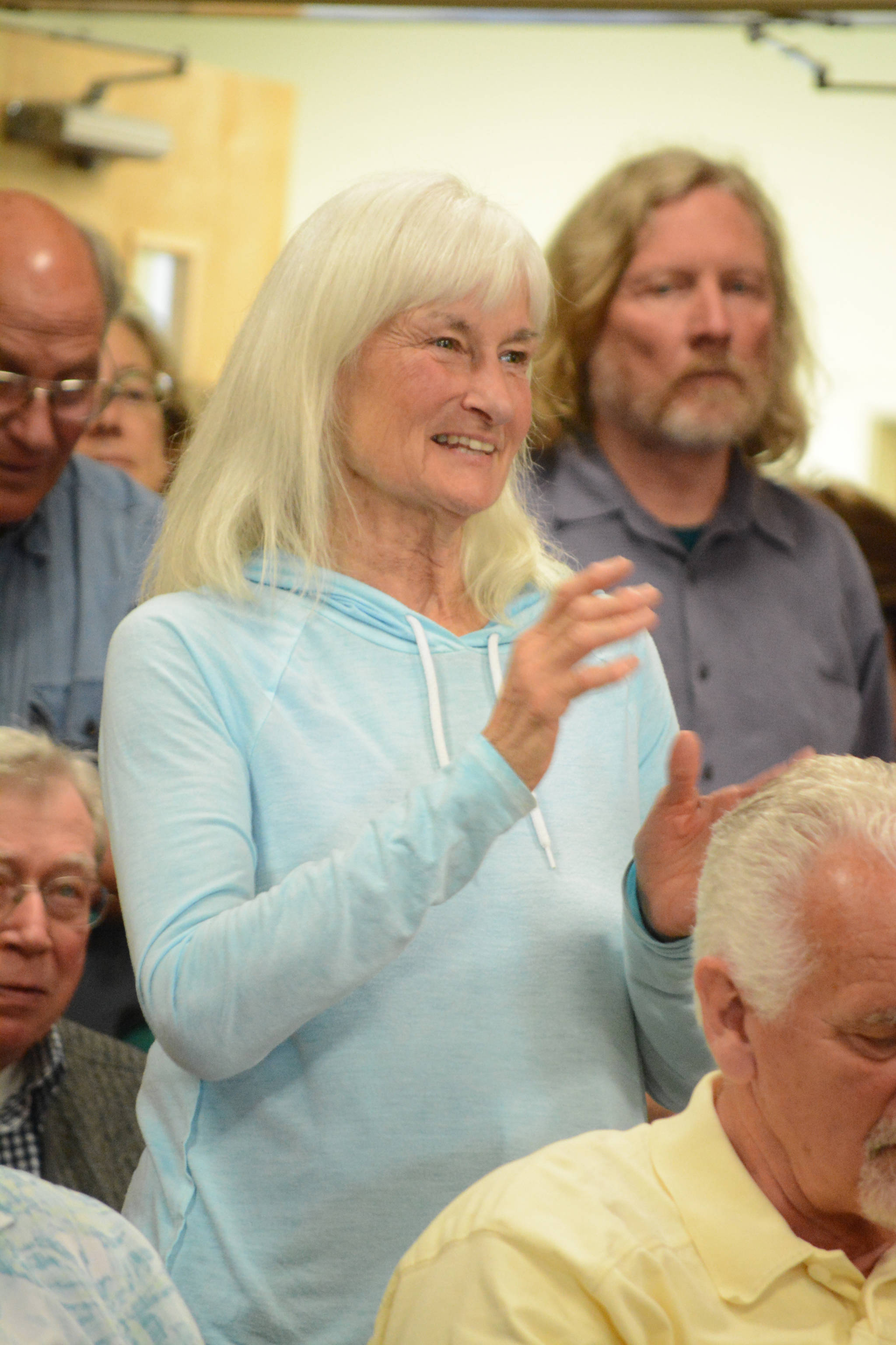 Homer resident Carla Stanley asks a question of Sen. Lisa Murkowski, R-Alaska, at a town hall meeting on health care Friday, July 7, 2017, at Homer City Hall. About 150 packed the Cowles Council Chambers to share their concerns about health care.