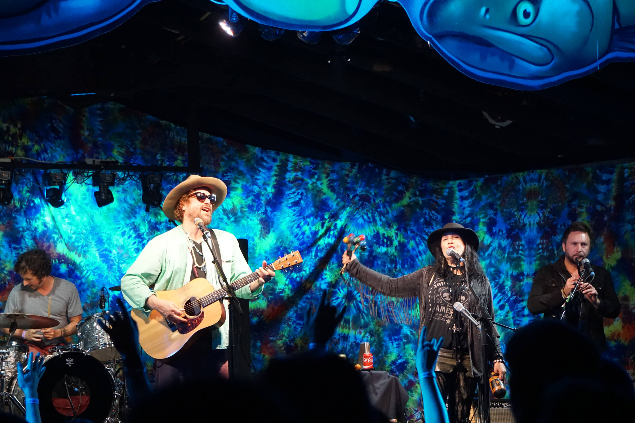 Zil Fessler, far left, Michael Glabicki, left, Liz Berlin, center, and Dirk Miller, right, of Rusted Root perform on Saturday night, Aug. 5, 2017, at Salmonfest, Ninilchik, Alaska. (Photo by Michael Armstrong, Homer News)