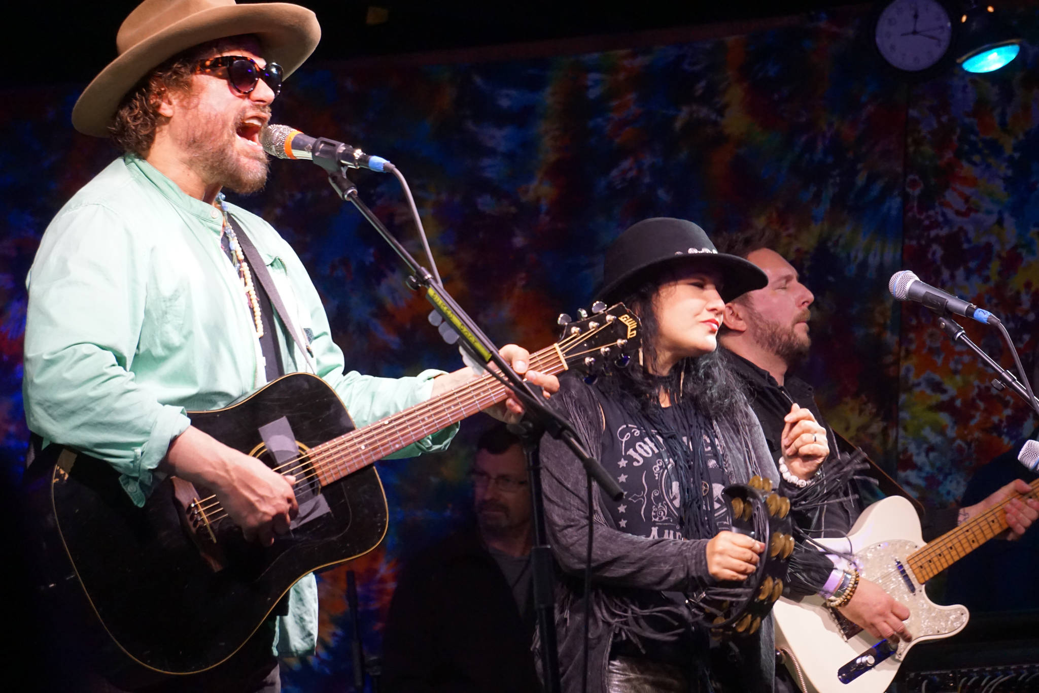 Michael Glabicki, left, Liz Berlin, center, and Dirk Miller, right, of Rusted Root perform on Saturday night, Aug. 5, 2017, at Salmonfest, Ninilchik, Alaska. (Photo by Michael Armstrong, Homer News)