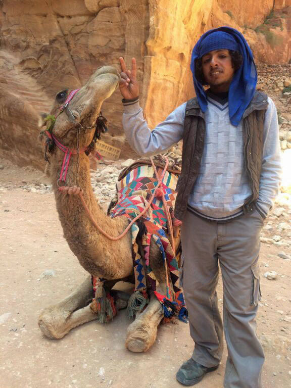 A Bedouin poses with his camel in 2015 in Petra, Jordan. (Photo courtesy Christina Whiting)