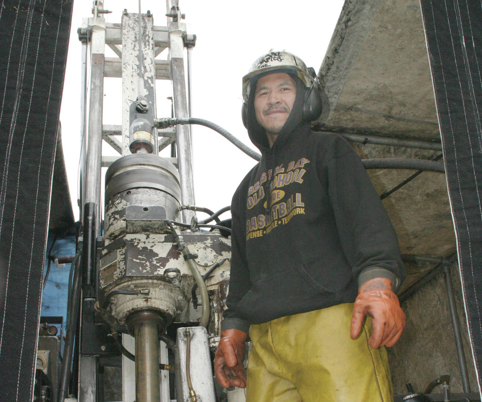 A worker pauses from working an exploration rig at the Pebble mine in this file photo. Sponsors of a ballot initiative targeting large-scale projects say they want more protection for salmon-bearing waters while their opponents argue it is yet another attempt to stop resource development such as Pebble. (Photo/File/AJOC)