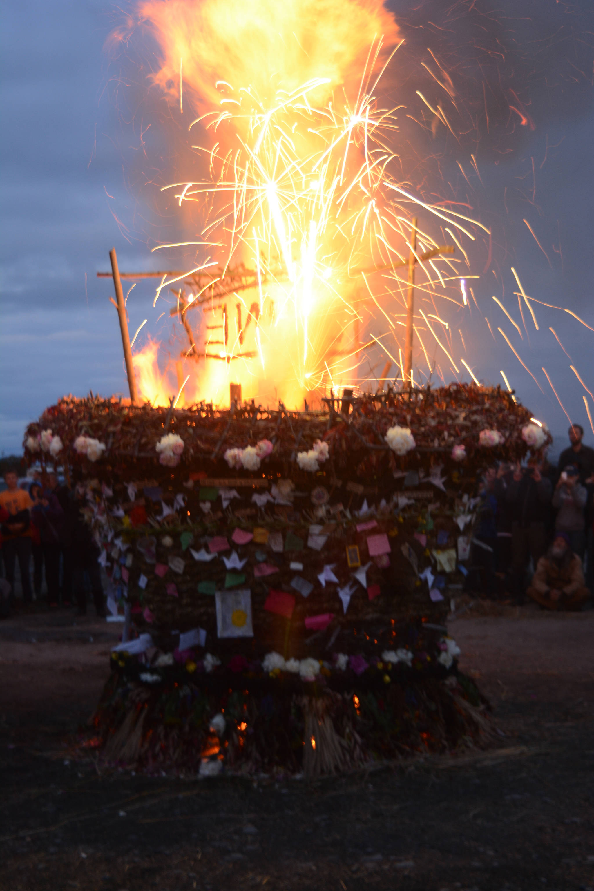 Sparklers ignite as Shine, the 2017 Burning Basket, catches on fire on Sunday, Sept. 10, 2017 at Mariner Park on the Homer Spit. (Photo by Michael Armstrong, Homer News)